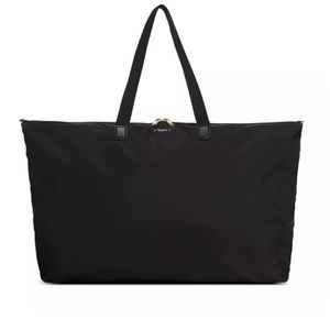 NWT Tumi travel tote & pouch set